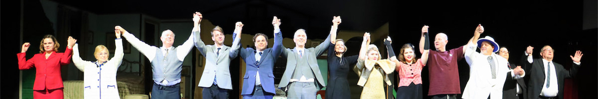 Cast members taking a bow at the end of a performance