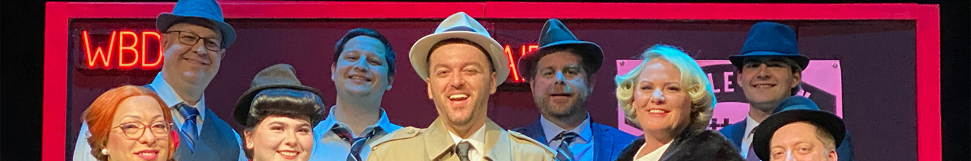 Cast members on stage