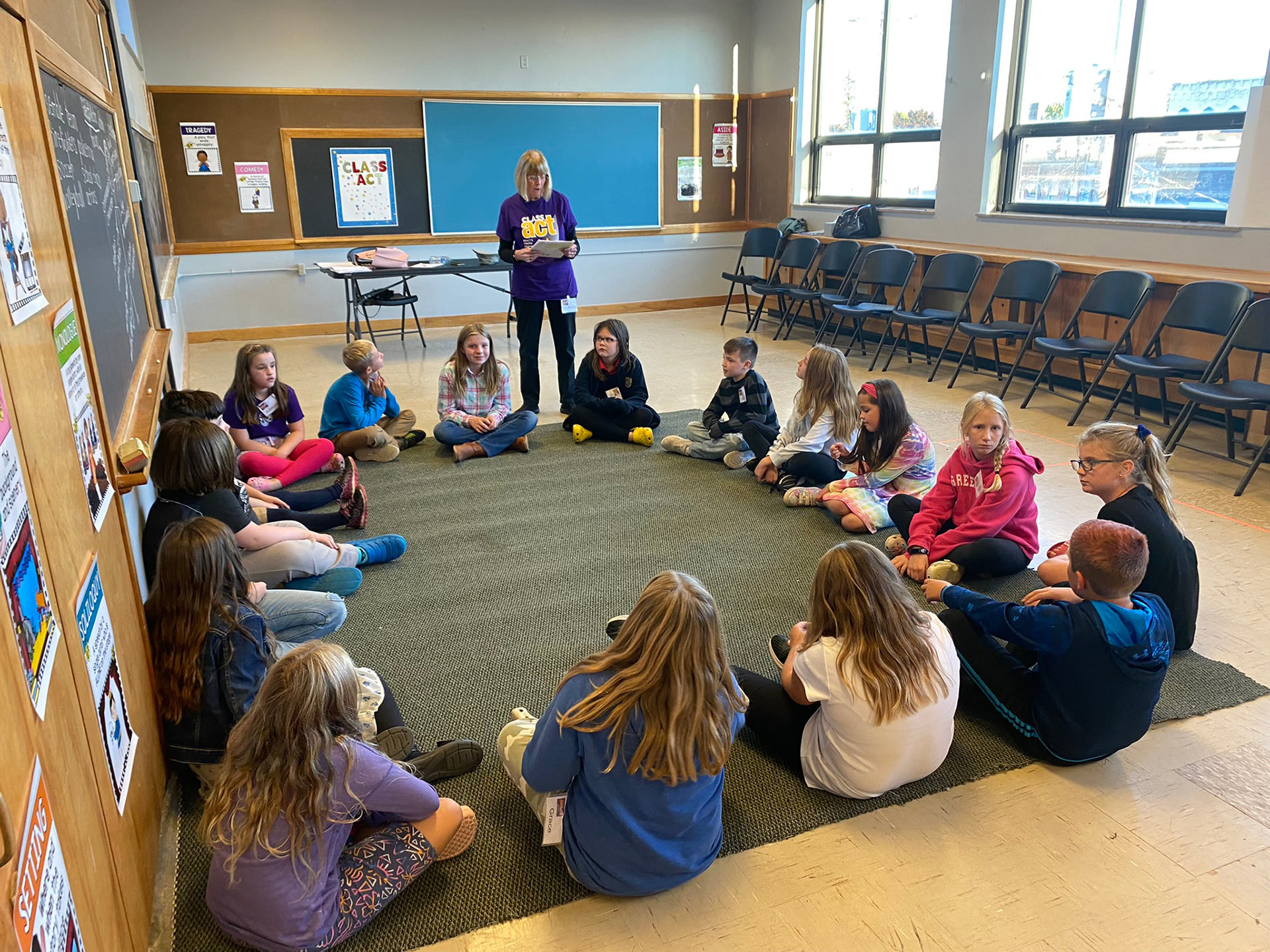 A children's class meeting in the loft